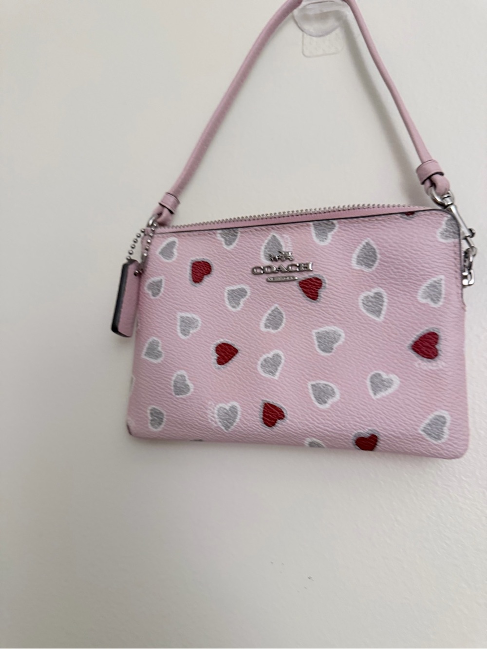Coach Pink Heart Print Wristlet with Red & Silver Accents